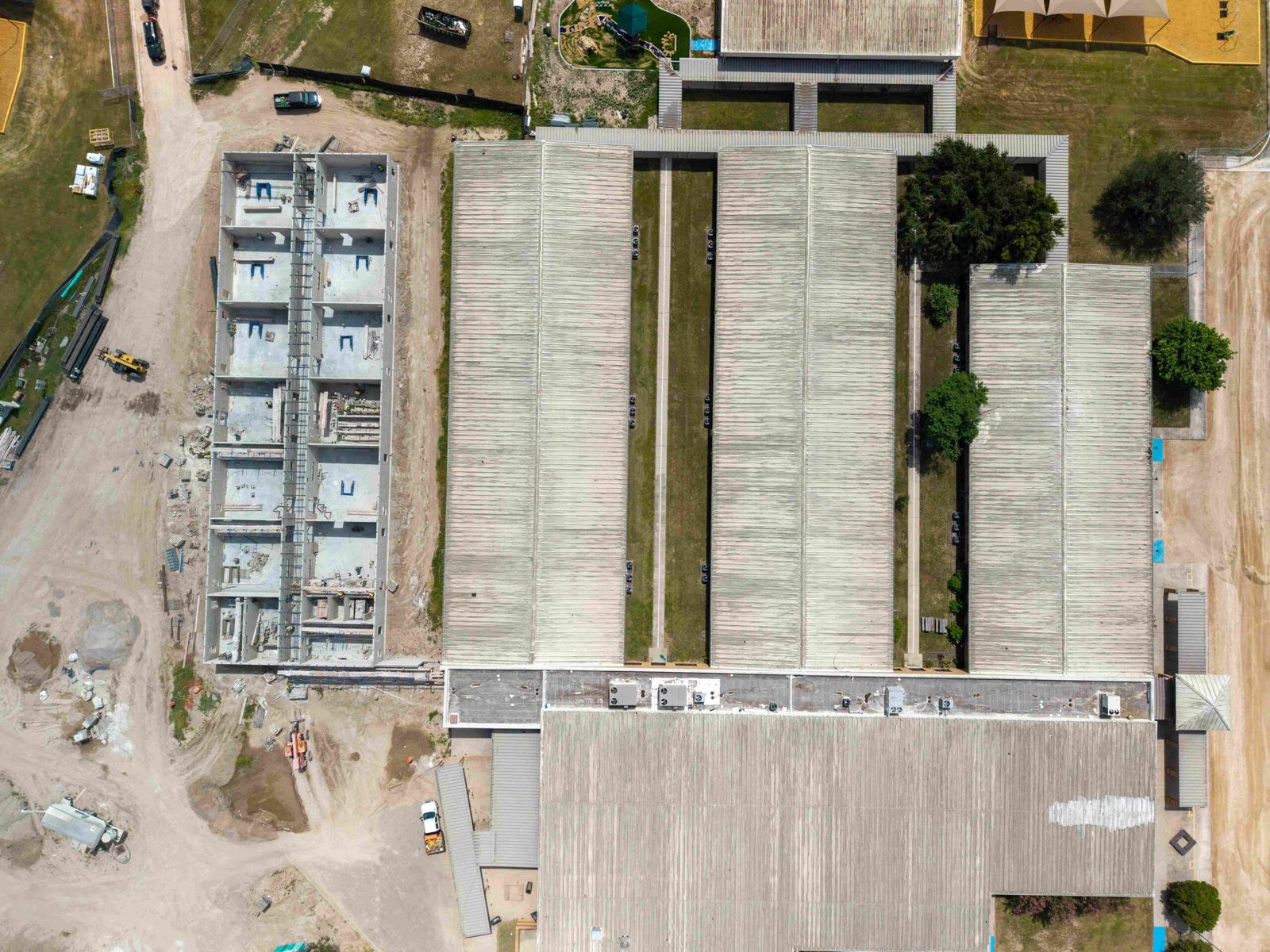 Drone view of foundations and framing for Donna ISD classroom additions, Rio Grande Valley, built by E-CON Group