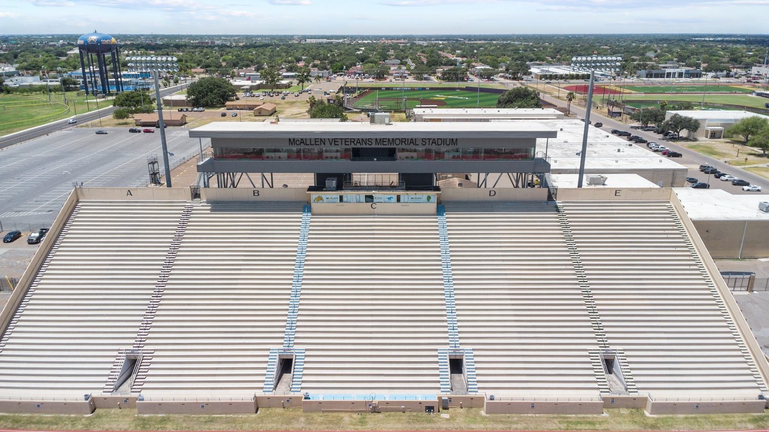 Drone view of the McAllen ISD Veterans Memorial Stadium press box over the field, E-CON Group CMAR project, Rio Grande Valley