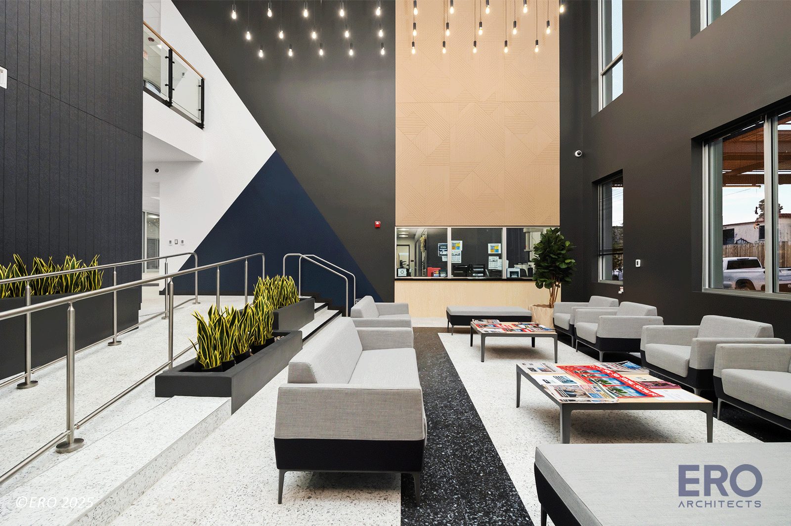 Two-story atrium inside San Juan City Hall, a $9.5M civic project delivered by E-CON Group in the Rio Grande Valley