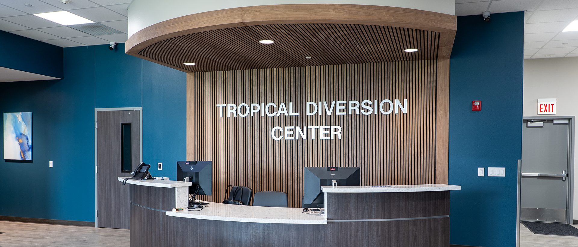 Reception desk at the Tropical Texas Behavioral Health Tropical Plaza finish-out in Edinburg, TX, a design-build project by E-CON Group